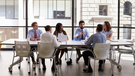 People in a meeting - LEAD Program business leadership training course