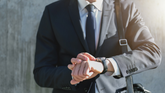 Man checking his watch - LEAD Program leadership training course