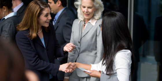 Women shaking hands - LEAD Program leadership training