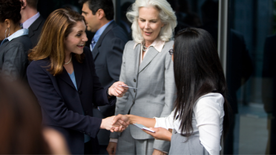 Women shaking hands - LEAD Program leadership training