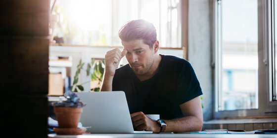 Man working with computer - LEAD Program leadership coaching