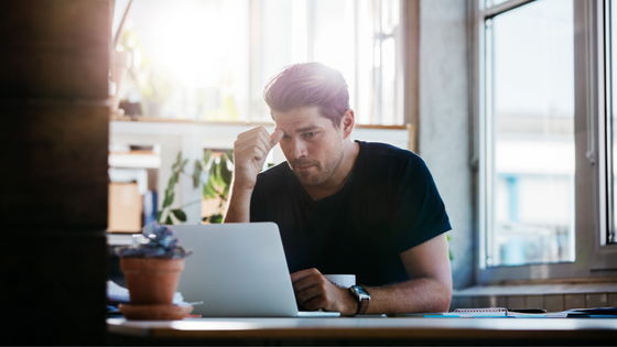 Man working with computer - LEAD Program leadership coaching